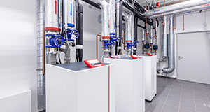 industrial heating system with multiple boilers and piping featuring modern technology for efficient energy use and optimized performance in HVAC systems
